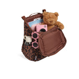 skoot leopard kids backpack outside unzipped filled up with kids toys