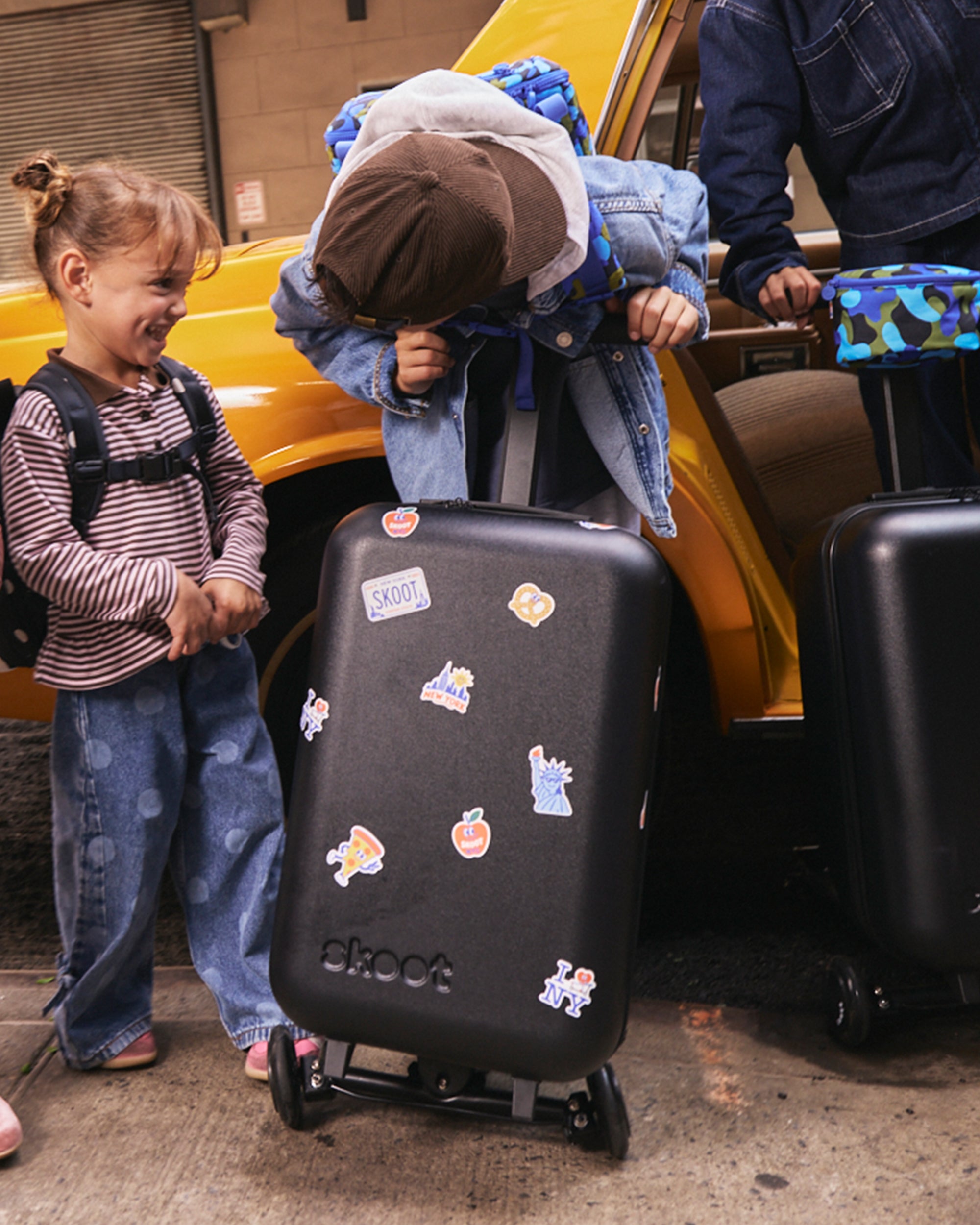 Skoot New York City Stickers on Onyx Luggage