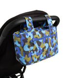blue camo skoot stroller caddy attached to a stroller