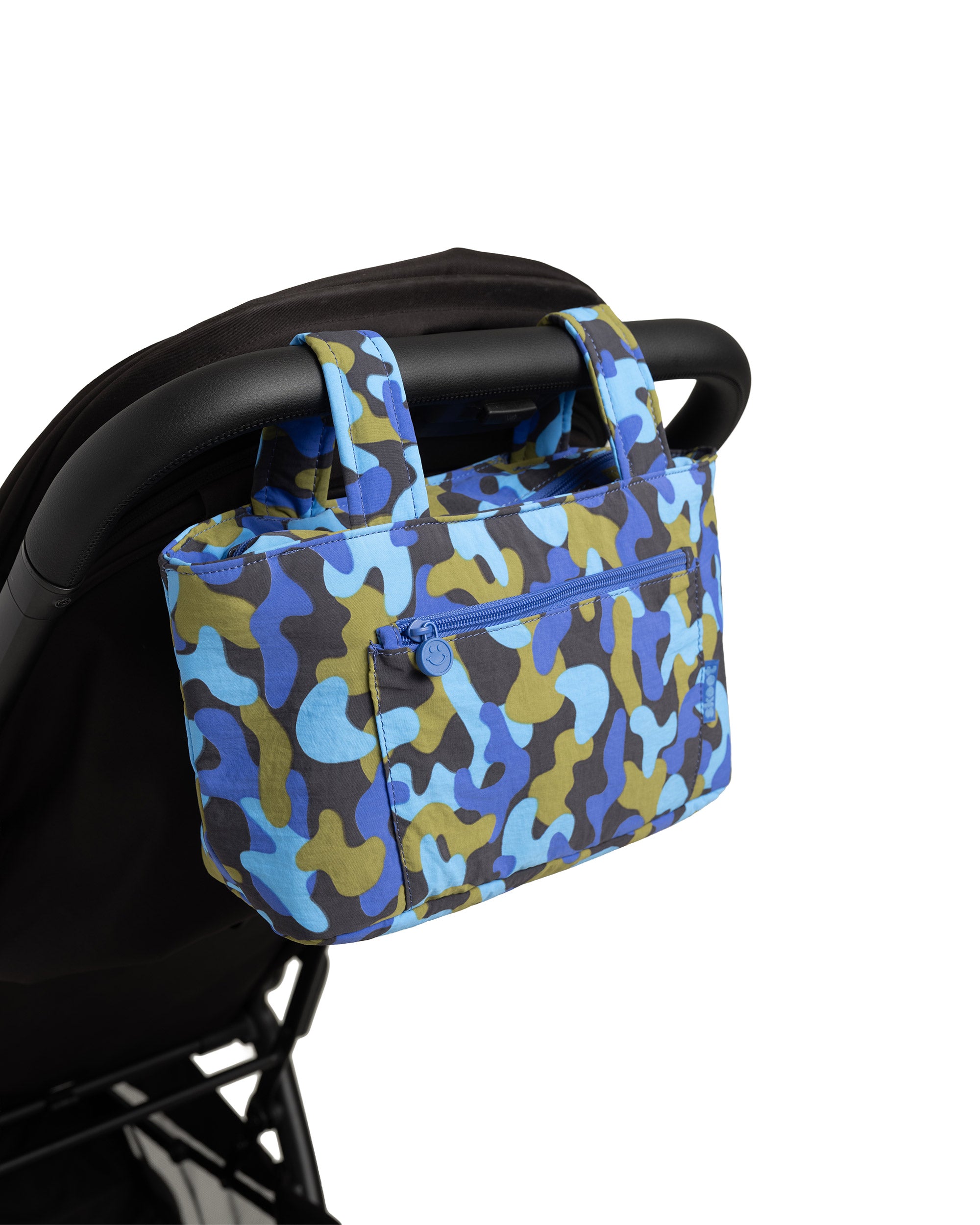 blue camo skoot stroller caddy attached to a stroller