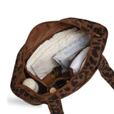 leopard skoot stroller caddy inside packed compartments