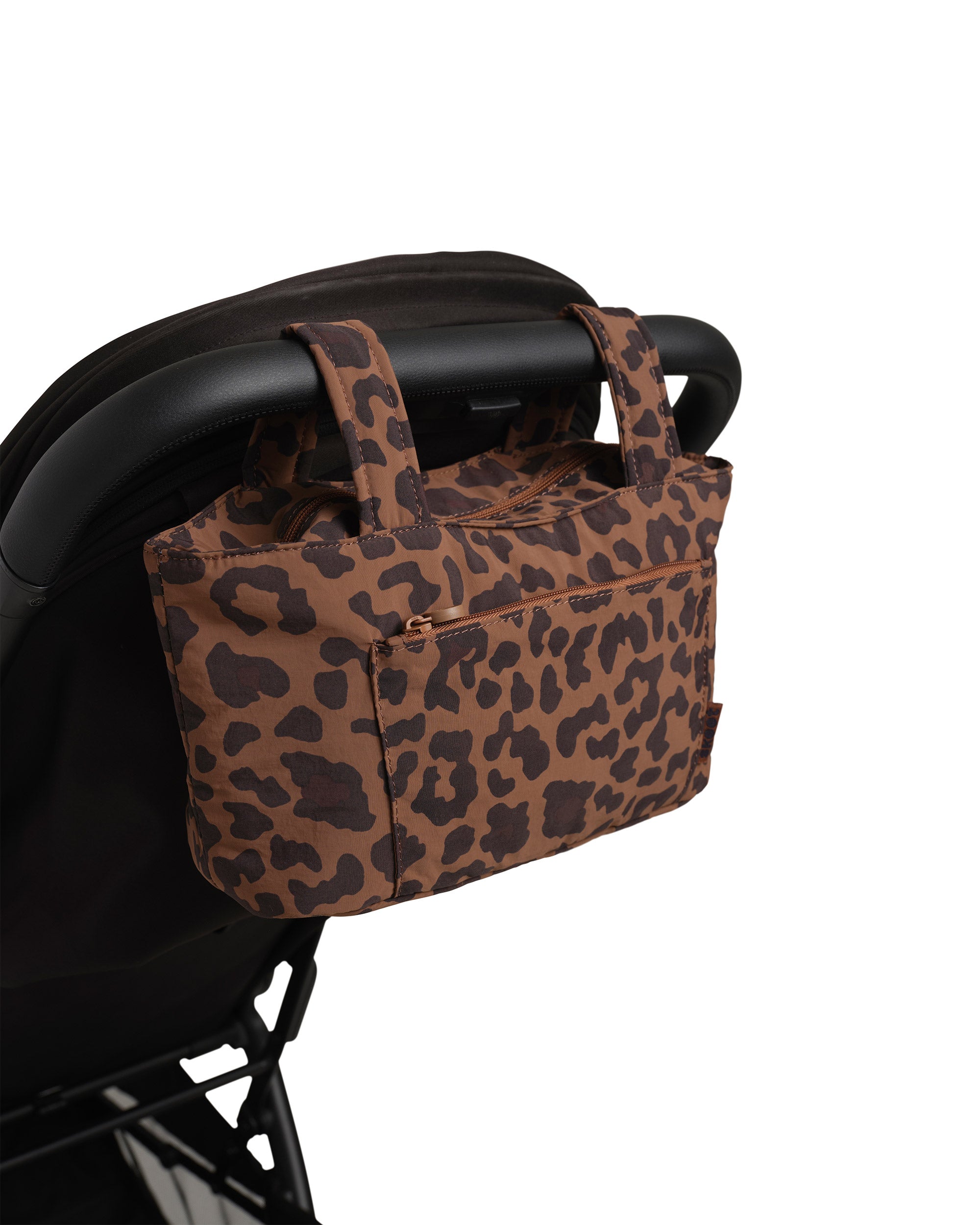 leopard skoot stroller caddy attached to a stroller