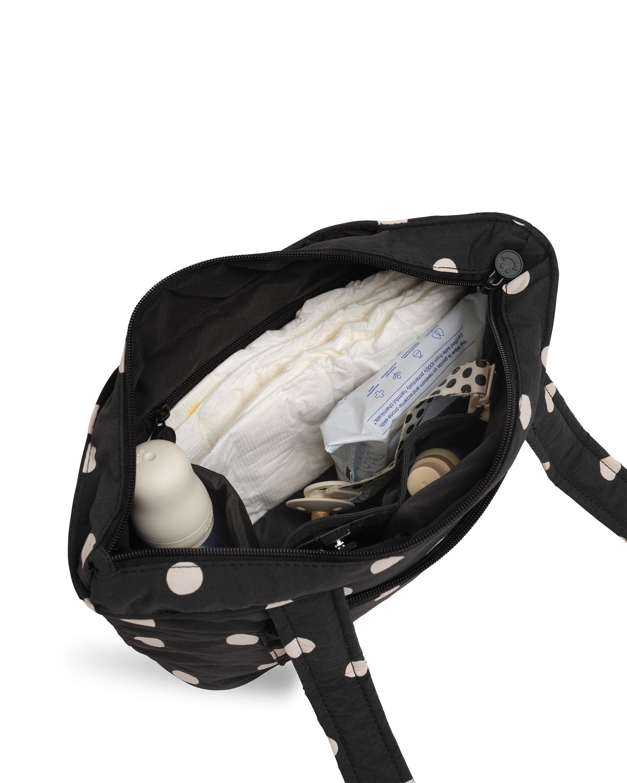 polka dot skoot stroller caddy inside packed compartments