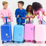 group photo of kids with the skoot skootcases puff pink pop pink jet blue sky blue go green