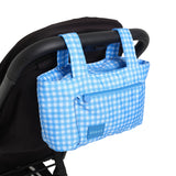 blue gingham skoot stroller caddy attached to a stroller