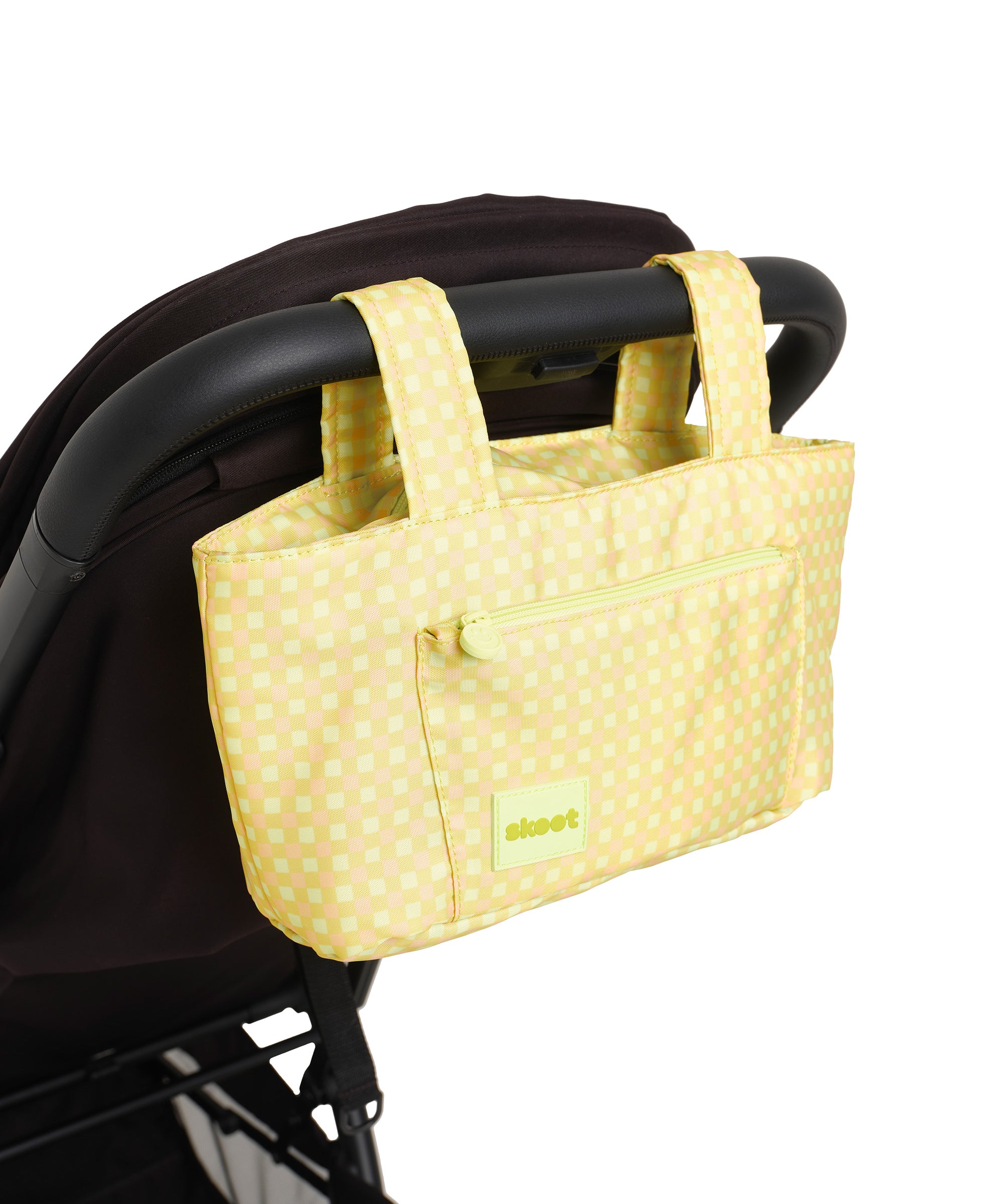 green gingham skoot stroller caddy attached to a stroller