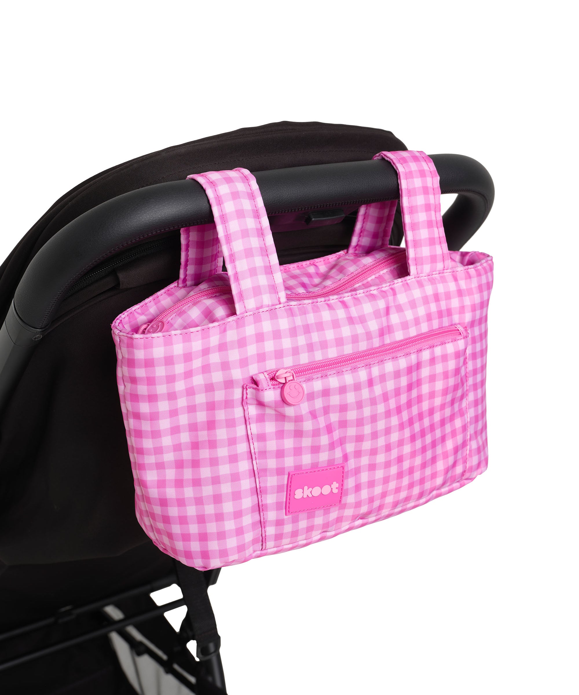 pink gingham skoot stroller caddy attached to a stroller