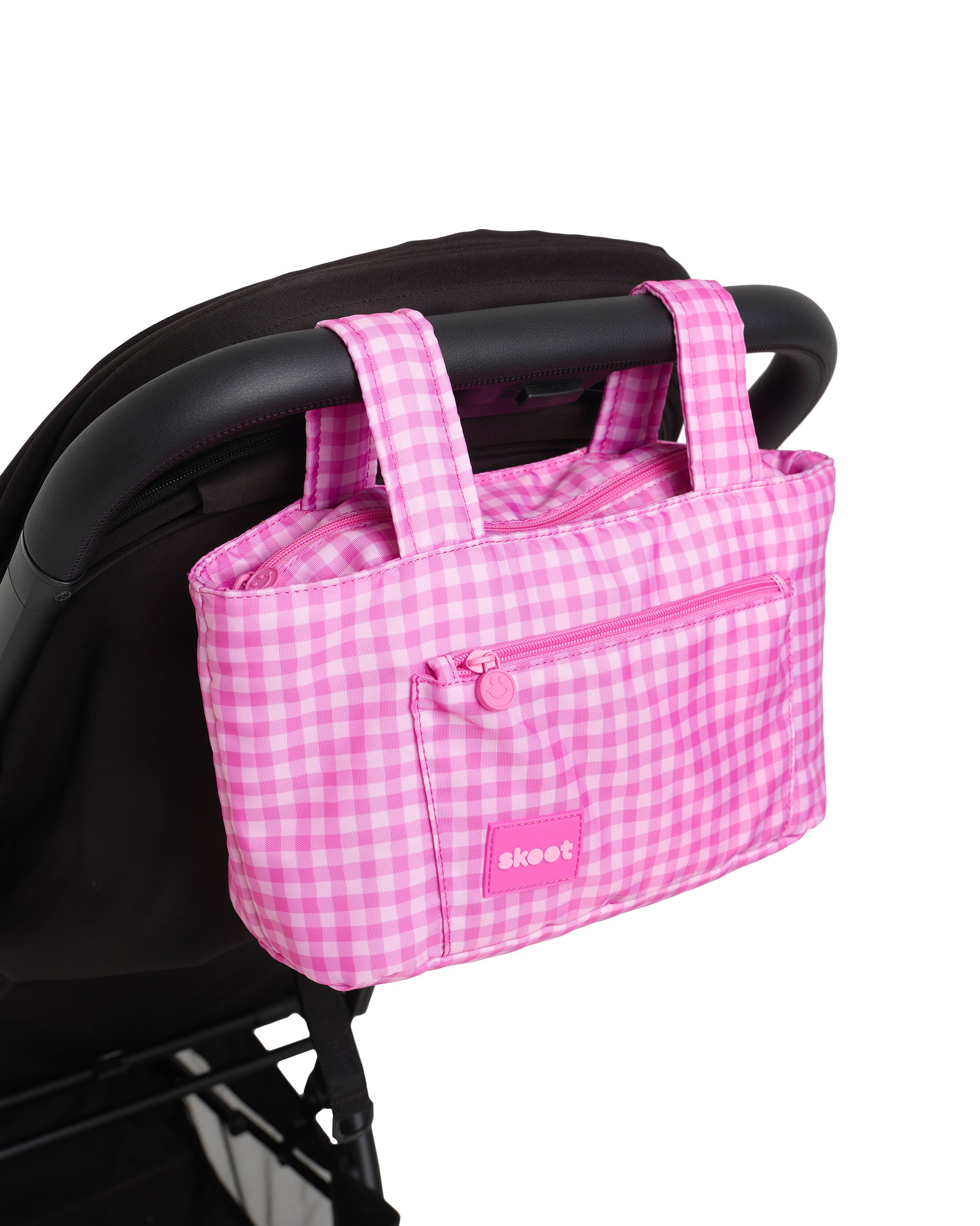 pink gingham skoot stroller caddy attached to a stroller