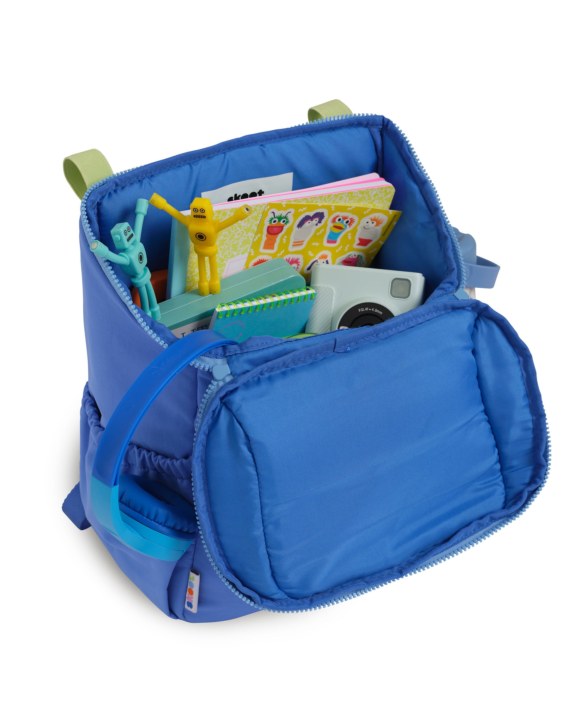 skoot jet blue kids backpack outside unzipped filled up with kids toys