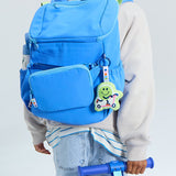 skoot kid wearing jet blue backpack