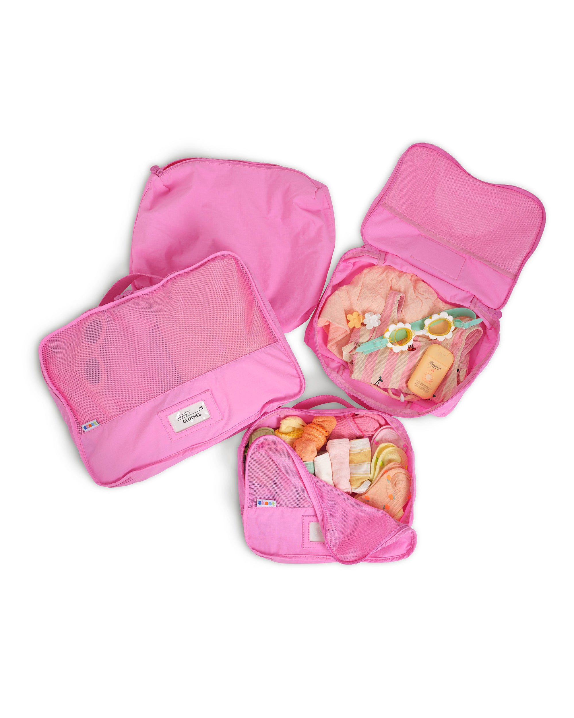 skoot pop pink packing cubes group set zipped and unzipped packed