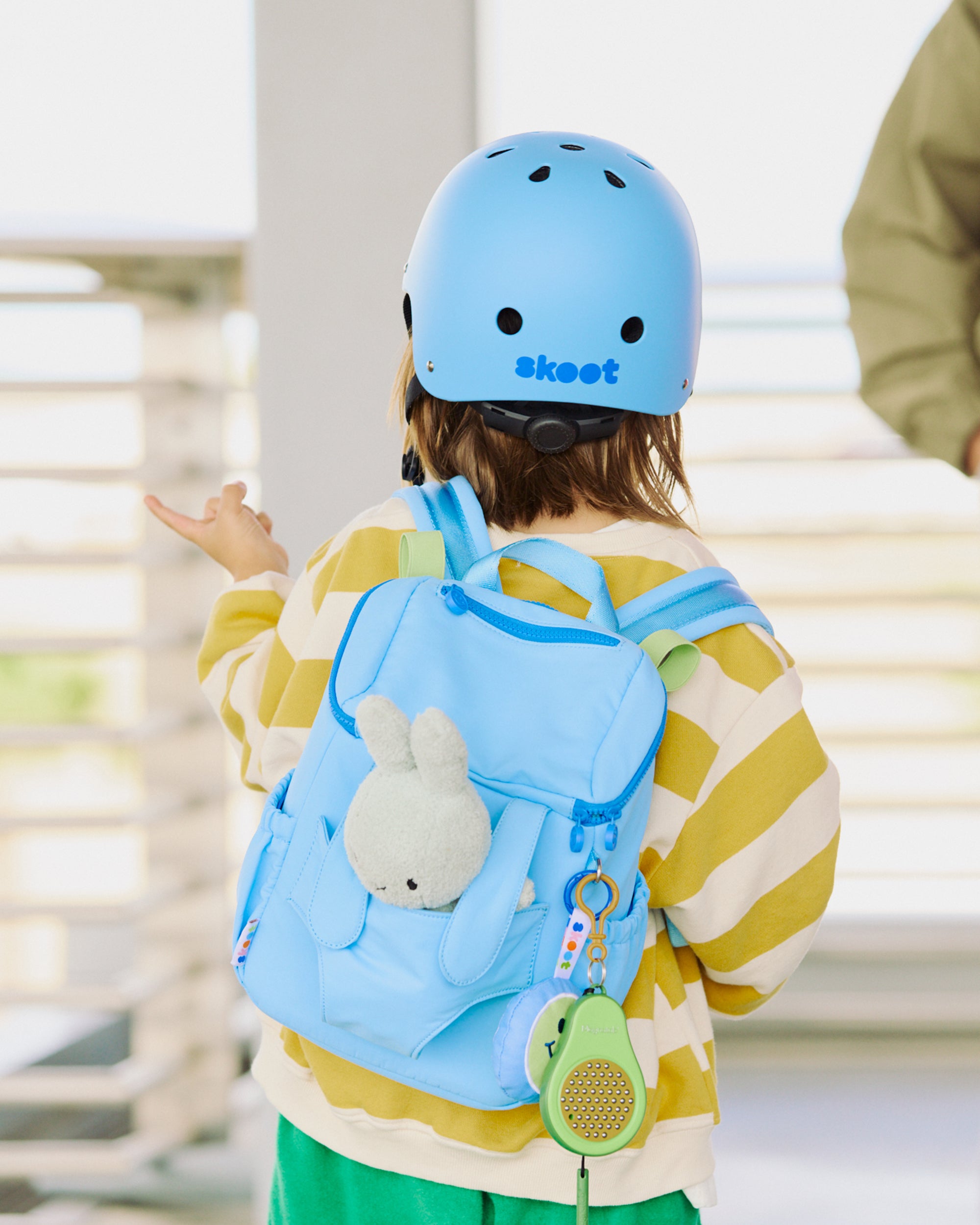 kid wearing skoot sky blue kids helmet