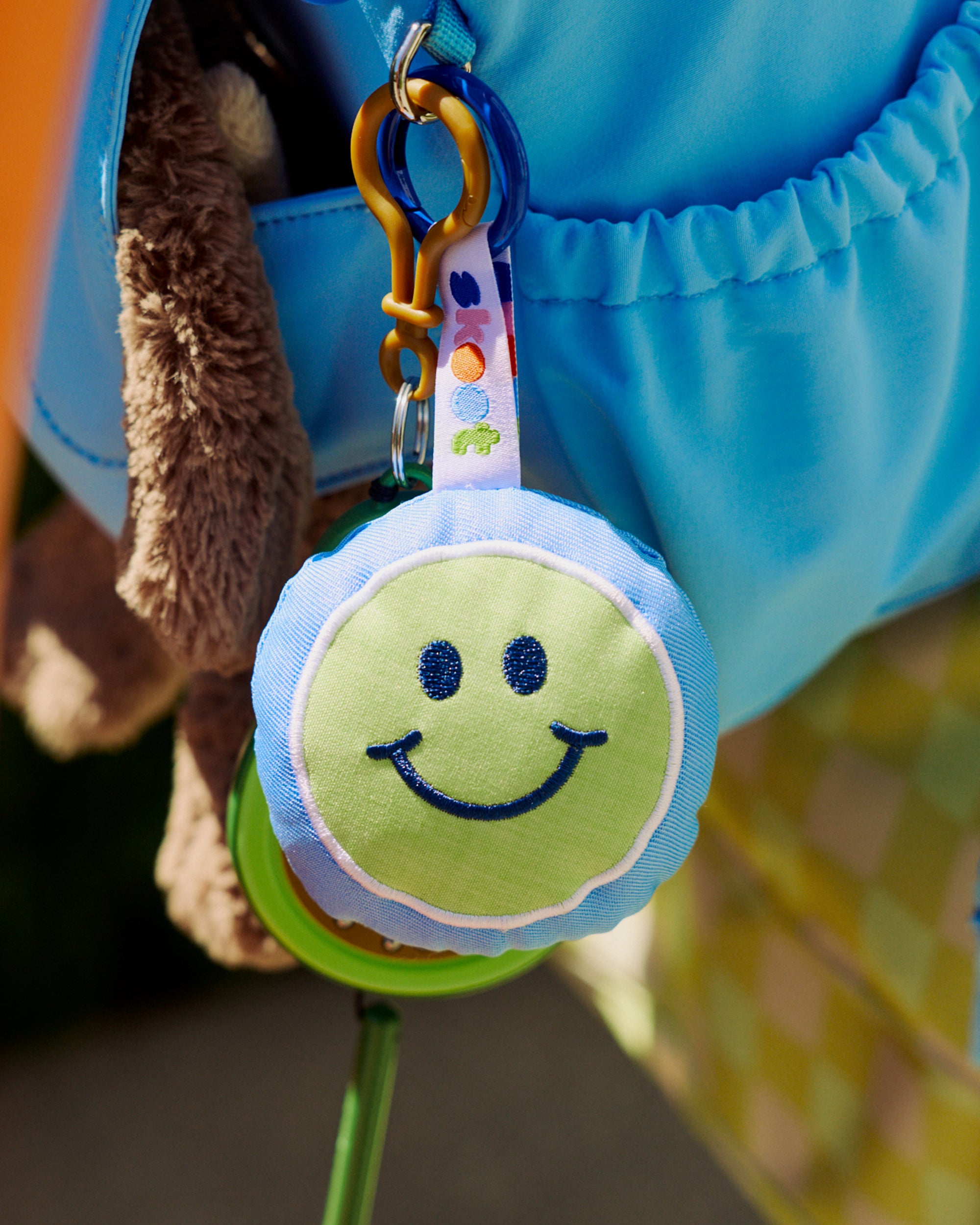 smiley bag charm